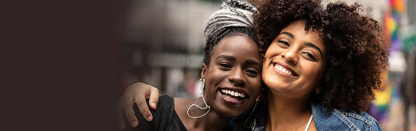 Two smiling women